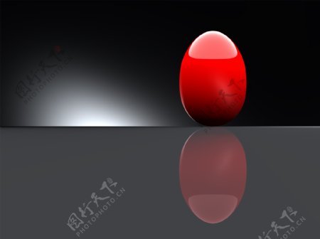 闪闪发光的红蛋在黑色的背景