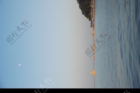 珠海渔女与太阳的遥望图片
