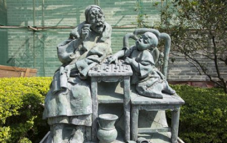 下棋教书先生小孩雕像