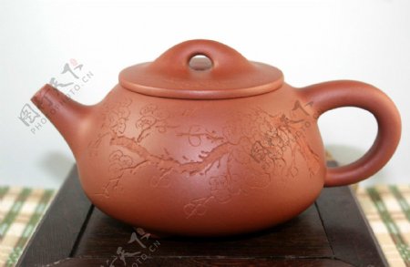 橙红色陶土茶壶图片