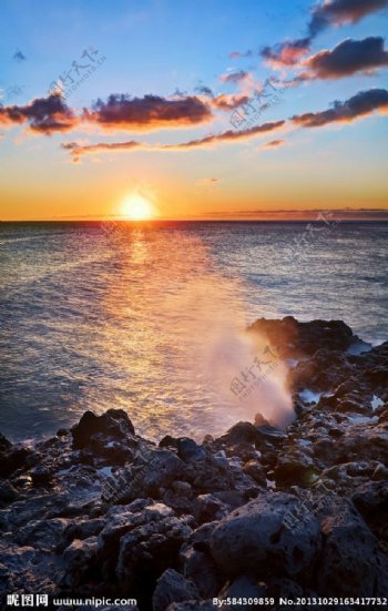 夕阳大海礁石图片