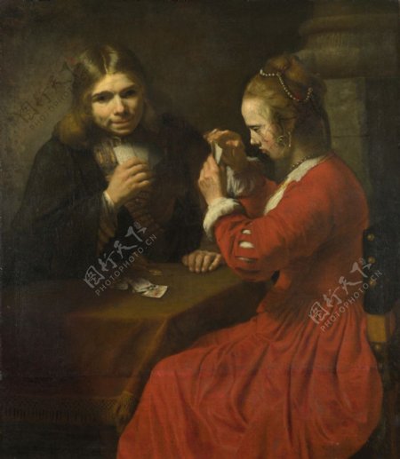一位年轻的男人和一个姑娘玩扑克牌图片