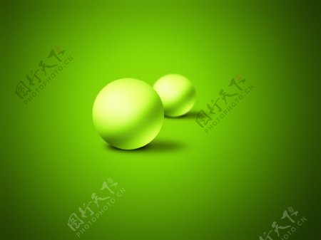 简洁绿色小球图片
