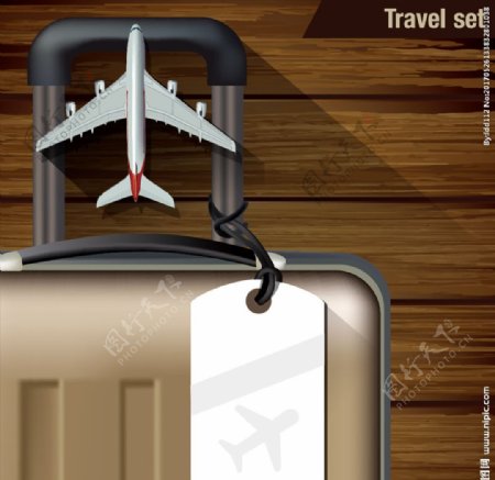 桌子上的行李箱和飞机创意矢量素
