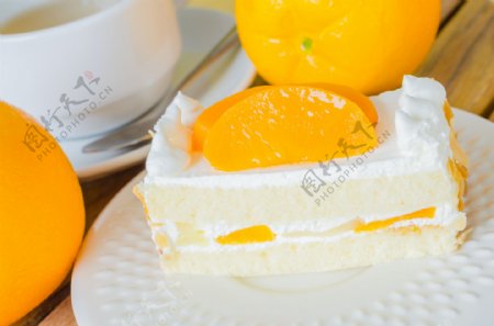 美味蛋糕上面的橙子片图片
