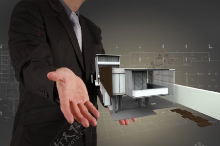 商务男士与别墅模型图片