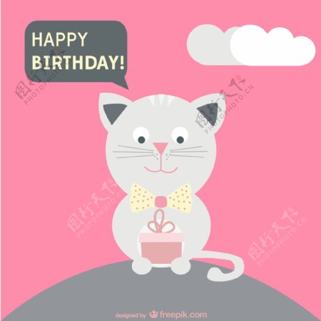 一只猫抱着一个生日快乐的生日卡片