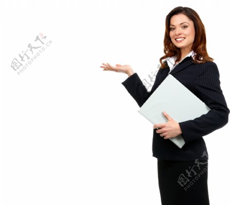 抱着笔记本电脑的商务女士图片