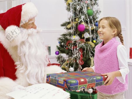 圣诞老人与可爱小女孩图片