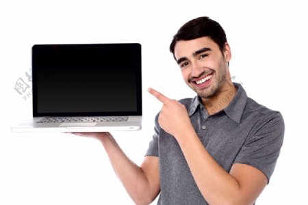 手指着平板电脑的男人图片