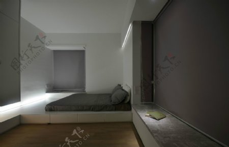 现代冷淡风卧室灰色背景墙室内装修效果图